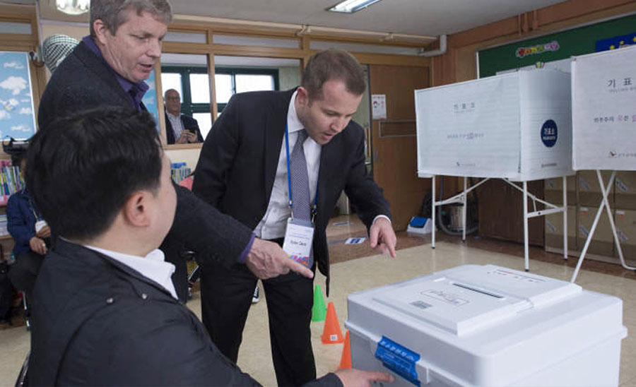 TAF Korea Country Representative Dylan Davis joins a tour of polling sites and a counting center organized by the NEC and A-WEB, May 9, 2017